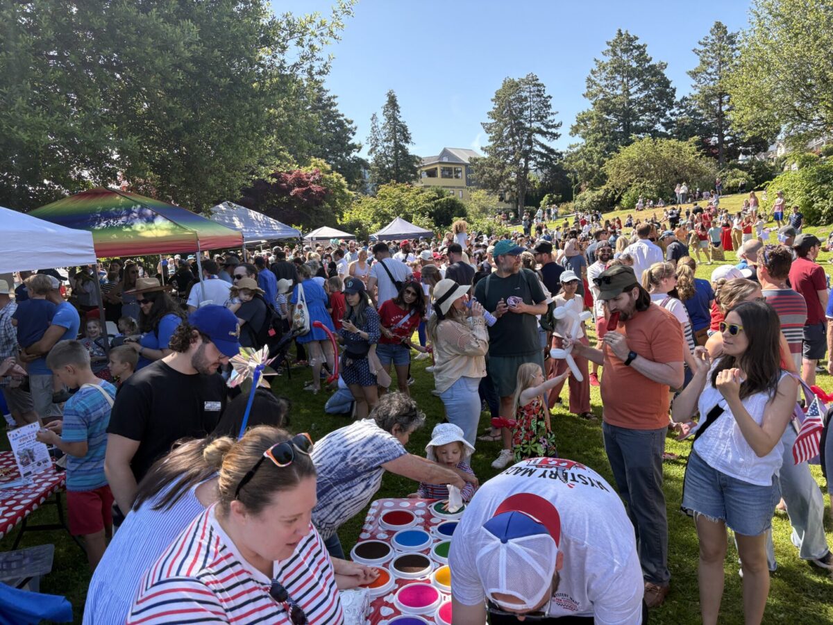 Families gathered together at an outdoor community festival